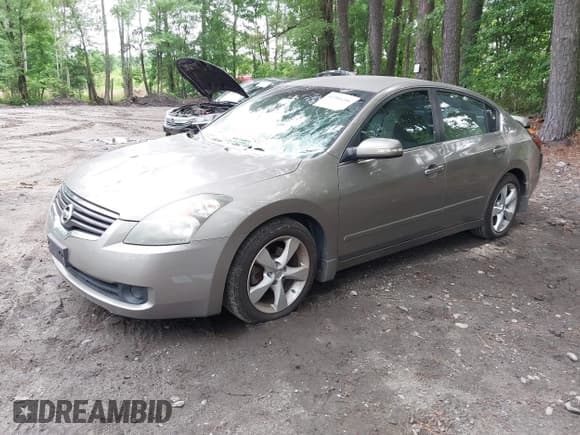 ✅ 2007 Nissan Altima SL • VIN: 1N4BL21E07N436159 • Lot: 42384206. Wystawiony na IAAI z przebiegiem 106 092 mil. Bezpłatny archiwum sprzedaży aukcyjnych z USA i szczegółowy raport historii pojazdu na DreamBid. Zdjęcie 2.