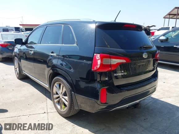 ✅ 2014 Kia Sorento SX Limited • VIN: 5XYKW4A70EG499832 • Lot: 43204101. Listed on IAAI with 158,890 mi. Free auction sales archive from the USA and detailed vehicle history report at DreamBid. Image 3.
