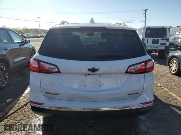 ✅ 2020 Chevrolet Equinox Premier • VIN: 2GNAXNEV4L6136250 • Lot: 84216555. Wystawiony na Copart z przebiegiem 95 757 mil. Bezpłatny archiwum sprzedaży aukcyjnych z USA i szczegółowy raport historii pojazdu na DreamBid. Zdjęcie 6.