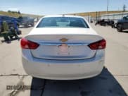 ✅ 2014 Chevrolet Impala LT • VIN: 1G1115SL4EU119975 • Лот: 70514794. Опубликован ранее на Copart с пробегом 150 115 миль. Бесплатный доступ к архиву аукционных продаж из США и подробный отчёт об истории автомобиля на DreamBid. Изображение 6.