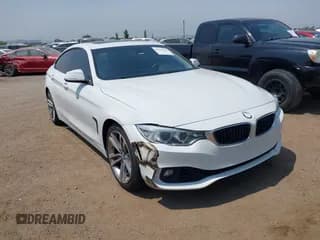 ✅ 2015 BMW 4 Series 428i • VIN: WBA4A9C57FGL86164 • Lot: 42629769. Listed on IAAI with 123,984 mi. Free auction sales archive from the USA and detailed vehicle history report at DreamBid. Image 1.