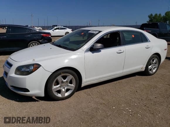 ✅ 2011 Chevrolet Malibu 1LS • VIN: 1G1ZB5E12BF212018 • Lot: 64849264. Listed on Copart with 159,424 mi. Free auction sales archive from the USA and detailed vehicle history report at DreamBid. Image 1.