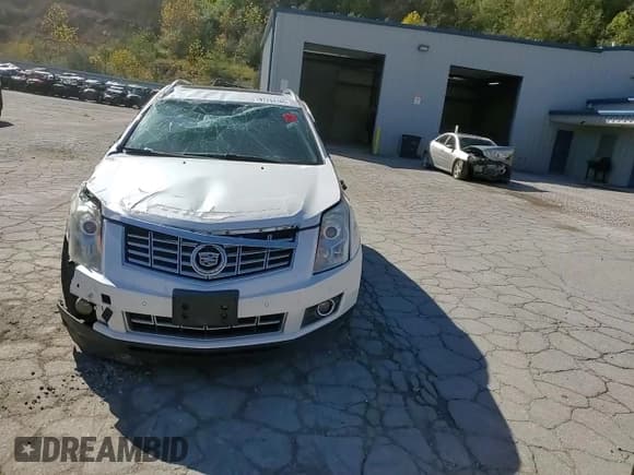 ✅ 2015 Cadillac SRX Luxury Collection • VIN: 3GYFNEE31FS548807 • Lot: 87253165. Wystawiony na Copart z przebiegiem 148 226 mil. Bezpłatny archiwum sprzedaży aukcyjnych z USA i szczegółowy raport historii pojazdu na DreamBid. Zdjęcie 14.