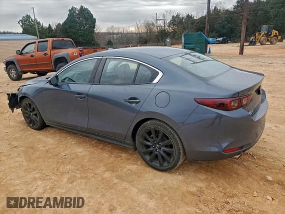 ✅ 2023 Mazda 3 S Carbon Edition • VIN: 3MZBPBCM6PM360294 • Lot: 96766485. Listed on Copart with 56,963 mi. Free auction sales archive from the USA and detailed vehicle history report at DreamBid. Image 2.