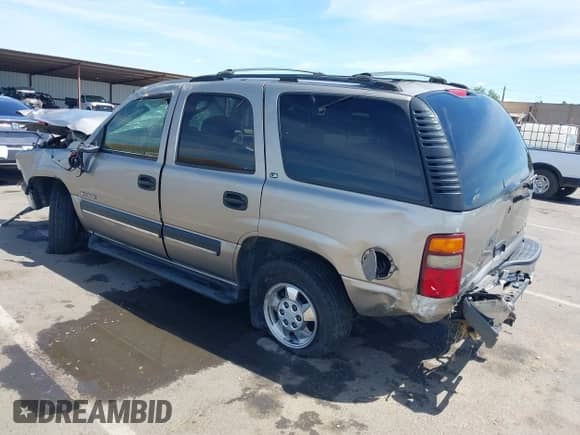 2001 Chevrolet Tahoe LT z VIN 1GNEK13T81R122136, wystawiony jako IAAI lot #42272857 z przebiegiem 216 060 mil mil oraz . Historia ofert i sprzedaży dostępna na DreamBid. Obrazek 3.