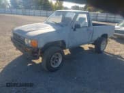 ✅ 1987 Toyota Pickup • VIN: JT4RN63R9H0132370 • Lot: 43595893. Wystawiony na IAAI z przebiegiem 249 349 mil. Bezpłatny archiwum sprzedaży aukcyjnych z USA i szczegółowy raport historii pojazdu na DreamBid. Zdjęcie 2.