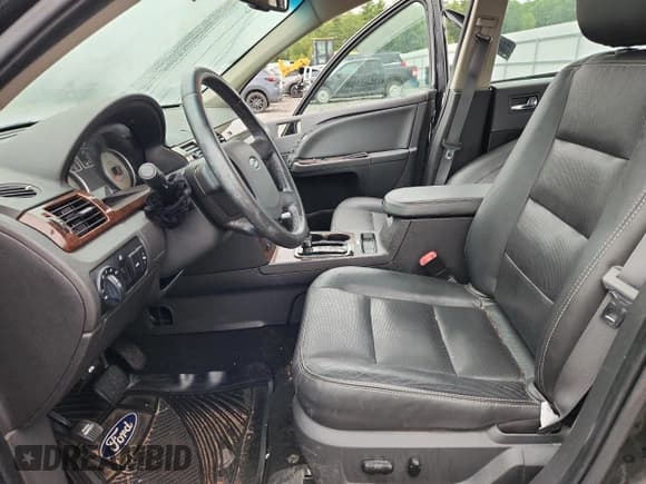 ✅ 2009 Ford Taurus Limited • VIN: 1FAHP25W09G100083 • Lot: 70769655. Wystawiony na Copart z przebiegiem 151 716 mil. Bezpłatny archiwum sprzedaży aukcyjnych z USA i szczegółowy raport historii pojazdu na DreamBid. Zdjęcie 7.