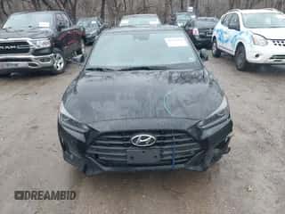 2019 Hyundai Veloster Premium z VIN KMHTG6AF0KU019038, wystawiony jako IAAI lot #41236750 z przebiegiem 83 164 mil mil oraz . Historia ofert i sprzedaży dostępna na DreamBid. Obrazek 6.