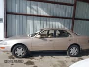 ✅ 1994 Toyota Camry LE • VIN: 4T1GK12E2RU002762 • Lot: 41376893. Listed on IAAI with 100,375 mi. Free auction sales archive from the USA and detailed vehicle history report at DreamBid. Image 14.