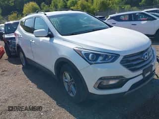 2017 Hyundai Santa Fe 2.4L z VIN 5XYZUDLB4HG402108, wystawiony jako IAAI lot #43087196 z przebiegiem 99 060 mil mil oraz . Historia ofert i sprzedaży dostępna na DreamBid. Obrazek 1.