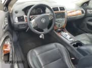 ✅ 2010 Jaguar XK • VIN: SAJWA4GB4ALB36058 • Лот: 89578525. Опубликован ранее на Copart с пробегом 33 891 миль. Бесплатный доступ к архиву аукционных продаж из США и подробный отчёт об истории автомобиля на DreamBid. Изображение 8.