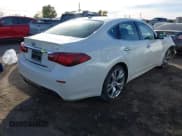 ✅ 2017 Infiniti Q70 3.7 • VIN: JN1BY1AP2HM741633 • Lot: 43635768. Listed on IAAI with Not provided. Free auction sales archive from the USA and detailed vehicle history report at DreamBid. Image 4.