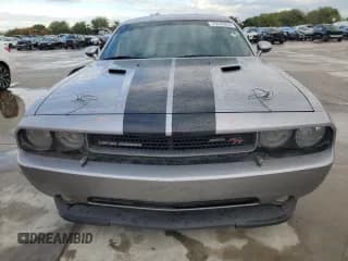 ✅ 2014 Dodge Challenger R/T 100th Anniversary Appearance • VIN: 2C3CDYBT1EH299187 • Lot: 79249854. Wystawiony na Copart z przebiegiem 129 803 mil. Bezpłatny archiwum sprzedaży aukcyjnych z USA i szczegółowy raport historii pojazdu na DreamBid. Zdjęcie 5.