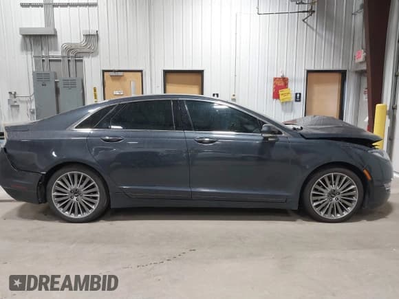 ✅ 2014 Lincoln MKZ • VIN: 3LN6L2JK0ER807621 • Lot: 42659559. Wystawiony na IAAI z przebiegiem 72 061 mil. Bezpłatny archiwum sprzedaży aukcyjnych z USA i szczegółowy raport historii pojazdu na DreamBid. Zdjęcie 12.