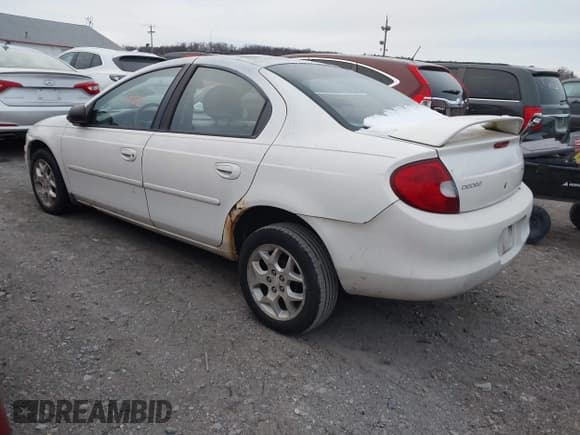 ✅ 2002 Dodge Neon ES • VIN: 1B3ES56C12D551971 • Lot: 43820328. Listed on IAAI with 220,000 mi. Free auction sales archive from the USA and detailed vehicle history report at DreamBid. Image 3.