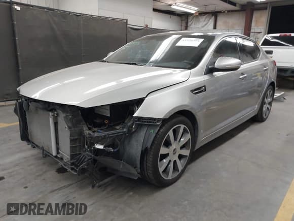 ✅ 2013 Kia Optima SX • VIN: 5XXGR4A6XDG106748 • Lot: 43325773. Listed on IAAI with 67,913 mi. Free auction sales archive from the USA and detailed vehicle history report at DreamBid. Image 2.