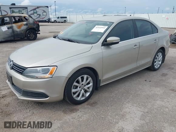 ✅ 2013 Volkswagen Jetta SE • VIN: 3VWDX7AJ2DM296040 • Lot: 42322512. Listed on IAAI with 136,599 mi. Free auction sales archive from the USA and detailed vehicle history report at DreamBid. Image 2.