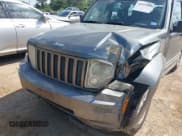 ✅ 2012 Jeep Liberty Sport Latitude • VIN: 1C4PJLAK9CW133919 • Lot: 42055888. Listed on IAAI with 164,839 mi. Free auction sales archive from the USA and detailed vehicle history report at DreamBid. Image 6.