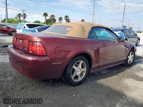 ✅ 2004 Ford Mustang Deluxe • VIN: 1FAFP44484F109180 • Lot: 53024575. Listed on Copart with 117,917 mi. Free auction sales archive from the USA and detailed vehicle history report at DreamBid. Image 3.