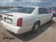 ✅ 2004 Cadillac DeVille • VIN: 1G6KD54Y84U116980 • Lot: 43137842. Listed on IAAI with 142,335 mi. Free auction sales archive from the USA and detailed vehicle history report at DreamBid. Image 4.