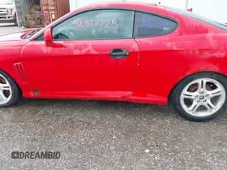 2003 Hyundai Tiburon GT z VIN KMHHN65F13U069681, wystawiony jako IAAI lot #42317725 z przebiegiem 219 002 mil mil oraz . Historia ofert i sprzedaży dostępna na DreamBid. Obrazek 6.