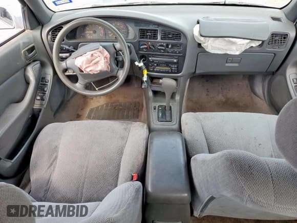 ✅ 1995 Toyota Camry LE • VIN: JT2GK12E7S0111308 • Lot: 66548415. Wystawiony na Copart z przebiegiem 237 050 mil. Bezpłatny archiwum sprzedaży aukcyjnych z USA i szczegółowy raport historii pojazdu na DreamBid. Zdjęcie 8.