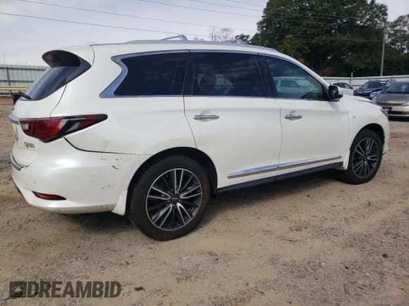✅ 2020 Infiniti QX60 Signature Edition • VIN: 5N1DL0MM3LC547719 • Lot: 75979604. Listed on Copart with 134,982 mi. Free auction sales archive from the USA and detailed vehicle history report at DreamBid. Image 3.