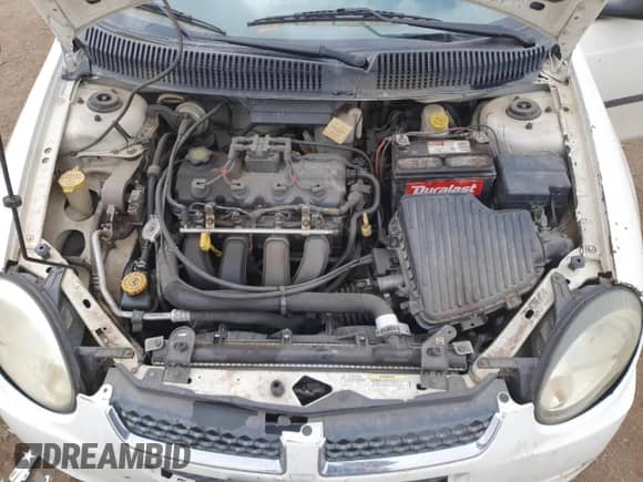 2003 Dodge Neon SE z VIN 1B3ES26C23D175247, wystawiony jako Copart lot #53463205 z przebiegiem 243 929 mil mil oraz Szkoda całkowita • Salvage title. Historia ofert i sprzedaży dostępna na DreamBid. Obrazek 11.