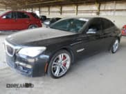 ✅ 2015 BMW 7 Series 750i • VIN: WBAYA8C58FG197731 • Lot: 81152265. Listed on Copart with 144,762 mi. Free auction sales archive from the USA and detailed vehicle history report at DreamBid. Image 1.