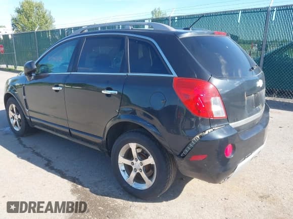 ✅ 2013 Chevrolet Captiva Sport LT • VIN: 3GNAL3EK7DS574821 • Lot: 42295328. Wystawiony na IAAI z przebiegiem 132 589 mil. Bezpłatny archiwum sprzedaży aukcyjnych z USA i szczegółowy raport historii pojazdu na DreamBid. Zdjęcie 3.