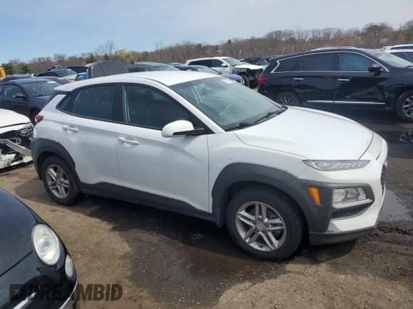 ✅ 2019 Hyundai Kona SE • VIN: KM8K12AA8KU318299 • Лот: 51760865. Опубликован ранее на Copart с пробегом 56 020 миль. Бесплатный доступ к архиву аукционных продаж из США и подробный отчёт об истории автомобиля на DreamBid. Изображение 4.
