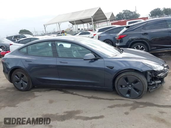 ✅ 2023 Tesla Model 3 • VIN: 5YJ3E1EA0PF644809 • Lot: 43271664. Listed on IAAI with 71,806 mi. Free auction sales archive from the USA and detailed vehicle history report at DreamBid. Image 14.