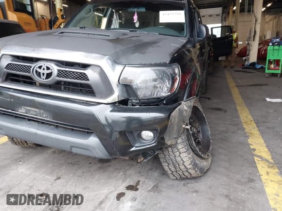 ✅ 2014 Toyota Tacoma • VIN: 3TMLU4ENXEM143779 • Lot: 43475792. Listed on IAAI with 156,975 mi. Free auction sales archive from the USA and detailed vehicle history report at DreamBid. Image 6.