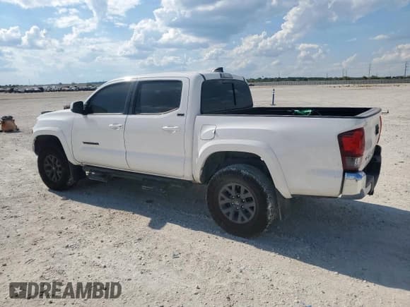 ✅ 2023 Toyota Tacoma SR5 • VIN: 3TYAZ5CN8PT041924 • Lot: 85926705. Listed on Copart with 34,678 mi. Free auction sales archive from the USA and detailed vehicle history report at DreamBid. Image 2.