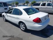 ✅ 2001 Ford Taurus LX • VIN: 1FAFP52U01G153060 • Лот: 42543418. Опубликован ранее на IAAI с пробегом 175 738 миль. Бесплатный доступ к архиву аукционных продаж из США и подробный отчёт об истории автомобиля на DreamBid. Изображение 3.
