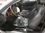 ✅ 2003 Jaguar XK • VIN: SAJDA42CX32A33825 • Lot: 86958814. Listed on Copart with 58,580 mi. Free auction sales archive from the USA and detailed vehicle history report at DreamBid. Image 7.