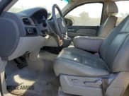 ✅ 2007 Chevrolet Suburban LS • VIN: 3GNFC16037G241031 • Lot: 76713514. Wystawiony na Copart z przebiegiem 232 549 mil. Bezpłatny archiwum sprzedaży aukcyjnych z USA i szczegółowy raport historii pojazdu na DreamBid. Zdjęcie 7.