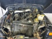 ✅ 1998 Jeep Wrangler Sport • VIN: 1J4FY19S4WP724572 • Лот: 70410395. Опубликован ранее на Copart с пробегом 205 264 миль. Бесплатный доступ к архиву аукционных продаж из США и подробный отчёт об истории автомобиля на DreamBid. Изображение 11.