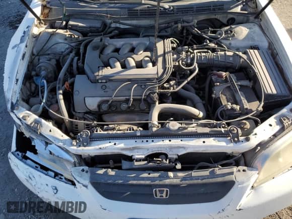 1999 Honda Accord EX с VIN 1HGCG2250XA013432, выставлен на аукционе Copart как лот 84782095 с пробегом 144 541 миль миль и Списание • Salvage title. История ставок и продаж доступна на DreamBid. Изображение 11.