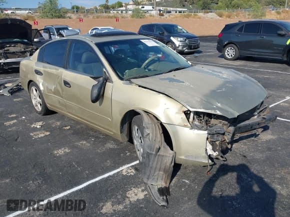 ✅ 2004 Nissan Altima SE • VIN: 1N4BL11D64C133735 • Lot: 43273273. Listed on IAAI with 205,696 mi. Free auction sales archive from the USA and detailed vehicle history report at DreamBid. Image 1.