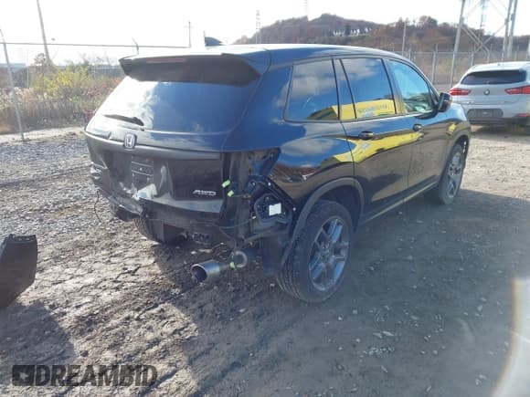 ✅ 2022 Honda Passport EX-L • VIN: 5FNYF8H54NB031339 • Lot: 43684218. Listed on IAAI with 75,892 mi. Free auction sales archive from the USA and detailed vehicle history report at DreamBid. Image 4.
