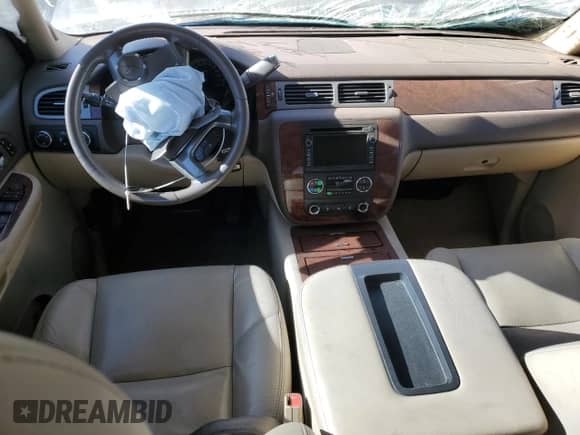 2009 Chevrolet Tahoe LTZ с VIN 1GNFK33289R129834, выставлен на аукционе Copart как лот 77392314 с пробегом 163 362 миль миль и Списание • Salvage title. История ставок и продаж доступна на DreamBid. Изображение 8.