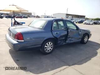 ✅ 2008 Ford Crown Victoria LX • VIN: 2FAFP74V08X130447 • Лот: 64450194. Опубликован ранее на Copart с пробегом 96 060 миль. Бесплатный доступ к архиву аукционных продаж из США и подробный отчёт об истории автомобиля на DreamBid. Изображение 3.