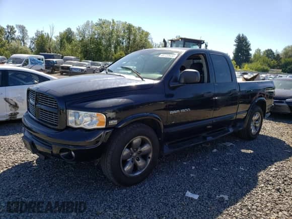 2004 Dodge 1500 SLT with VIN 1D7HU18D14S777386, listed as a Copart auction lot 69720634 with 151,840 mi miles and Clean title. Bid and sale history available at DreamBid. Image 1.