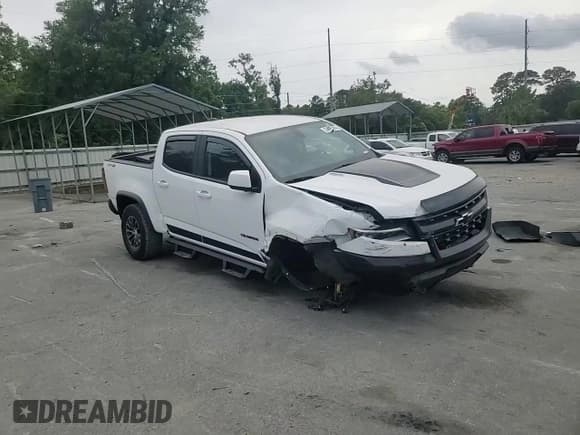 ✅ 2020 Chevrolet Colorado 4WD ZR2 • VIN: 1GCPTEE13L1154592 • Lot: 53695085. Listed on Copart with 35,907 mi. Free auction sales archive from the USA and detailed vehicle history report at DreamBid. Image 13.