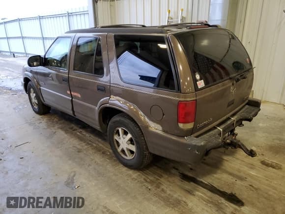 ✅ 1999 Oldsmobile Bravada • VIN: 1GHDT13W5X2717212 • Lot: 89085575. Wystawiony na Copart z przebiegiem 246 366 mil. Bezpłatny archiwum sprzedaży aukcyjnych z USA i szczegółowy raport historii pojazdu na DreamBid. Zdjęcie 2.