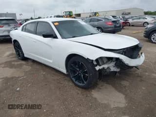 ✅ 2018 Dodge Charger SXT • VIN: 2C3CDXBG7JH135661 • Lot: 42157304. Listed on IAAI with 232,788 mi. Free auction sales archive from the USA and detailed vehicle history report at DreamBid. Image 1.