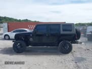 ✅ 2008 Jeep Wrangler Unlimited Sahara • VIN: 1J4GA59188L587606 • Lot: 43082389. Listed on IAAI with 120,757 mi. Free auction sales archive from the USA and detailed vehicle history report at DreamBid. Image 14.