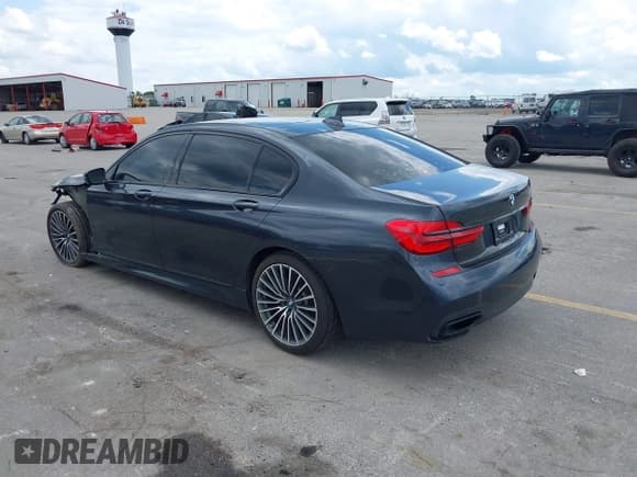 ✅ 2019 BMW 7 Series 740i • VIN: WBA7E2C57KB217844 • Lot: 42378704. Listed on IAAI with 73,139 mi. Free auction sales archive from the USA and detailed vehicle history report at DreamBid. Image 3.