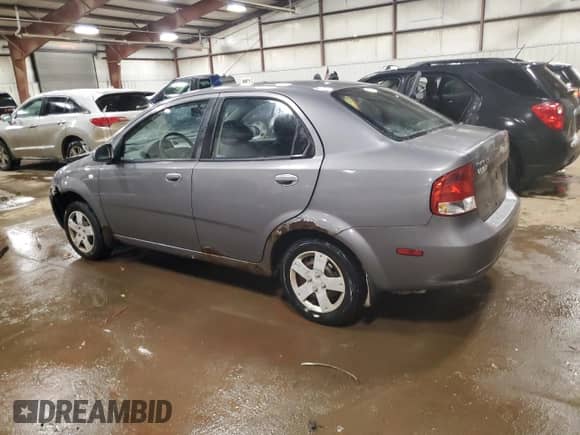 2006 Chevrolet Aveo LS z VIN KL1TD56646B553734, wystawiony jako Copart lot #88496205 z przebiegiem 156 610 mil mil oraz Czysty tytuł • Clean title. Historia ofert i sprzedaży dostępna na DreamBid. Obrazek 2.